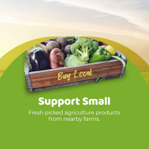 Wooden crate filled with fresh vegetables and fruits with a 'Buy Local' sign.