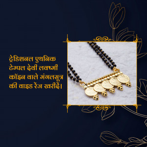 Close-up of a black beaded mangalsutra with gold pendants on a marble surface.