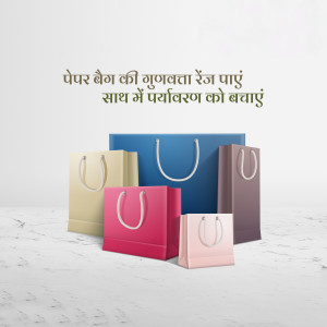 Assortment of colorful paper shopping bags on a marble surface.