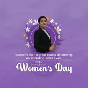 A woman in a black suit with floral decorations and text celebrating Women's Day.