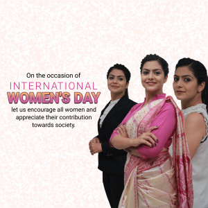 Three professional women smiling and posing for International Women's Day