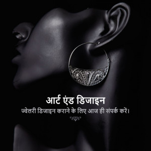 Close-up of a woman wearing ornate silver hoop earrings