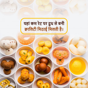 A colorful flat lay of various Indian sweets in small white bowls.