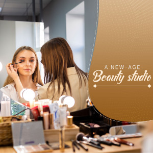 Woman getting makeup applied by a professional in a beauty studio.