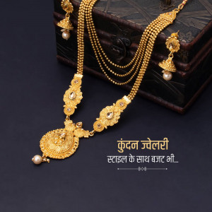 Close-up of a gold necklace and earring set with pearl accents