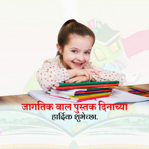 A young girl smiling while sitting at a desk with books, with text wishing a Happy International Children's Book Day.