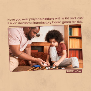 A father and son are engaged in a game of checkers on the floor.