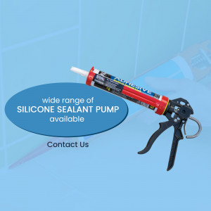 Close-up of a red and black silicone sealant tube in a black caulking gun against a blue tiled background.