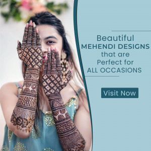 Close-up of a woman's hands adorned with intricate henna designs.
