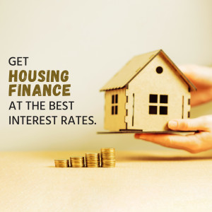 A hand holding a wooden house model over a stack of gold coins, promoting housing finance.