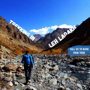 A person trekking in a mountainous landscape in Ladakh, with text overlay promoting trekking tours.