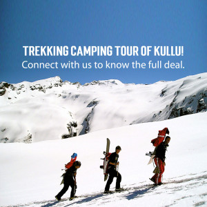 People trekking through snowy mountains in Kullu