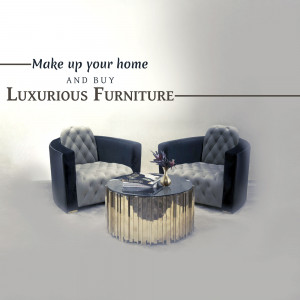 Two elegant armchairs and a gold coffee table in a modern living room setting.