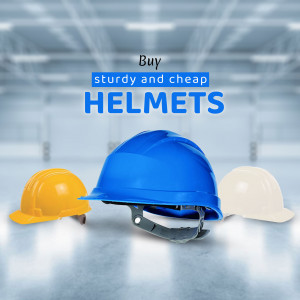Three construction helmets - blue, yellow, and white - against a blurred warehouse background.