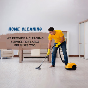 Man vacuuming a living room floor as part of a home cleaning service.