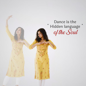 Woman in yellow kurta performing a dance pose