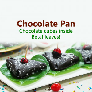 Chocolate Paan with cherry on top served on betel leaves