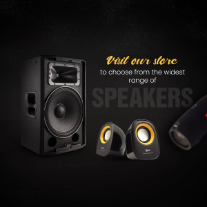 Black speakers with yellow accents and text promoting a store visit.