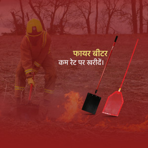 A firefighter in protective gear using tools to combat a wildfire.