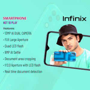 A young man holding an Infinix Hot 10 Play smartphone while wearing a bucket hat.