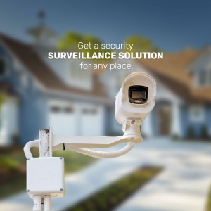 Security camera mounted on a house