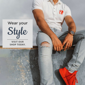 Man wearing a white polo shirt, ripped jeans, and red sneakers with a promotional text overlay.
