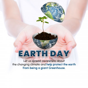 Hands holding a globe with a seedling, representing Earth Day and environmental protection.