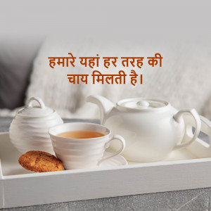 White teapots and cups with tea and a cookie on a white tray