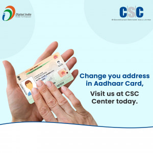 Hand holding an Aadhaar card with text promoting address change services at CSC centers.