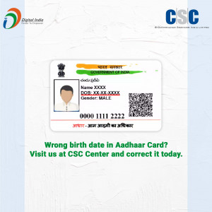 Image of an Aadhaar card with a message about correcting birth date errors at CSC centers.