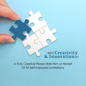 Hand placing a puzzle piece on others, symbolizing creativity and innovation.