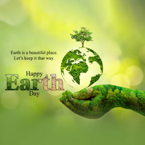 Earth Day graphic with a tree-shaped Earth held in a hand