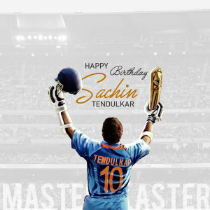 Sachin Tendulkar celebrating a century with bat raised in the air