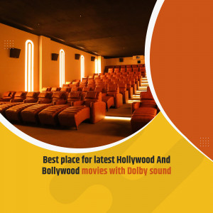Interior view of a modern movie theater with comfortable seating and Dolby sound.
