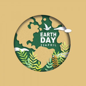 Paper cut style Earth Day graphic with a bird and leaves