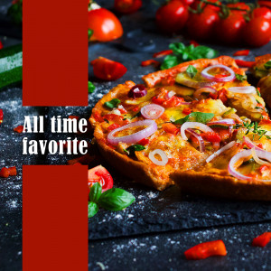 Close-up of a slice of vegetable pizza with fresh tomatoes and herbs
