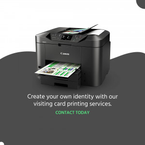 Black Canon printer printing business cards with a green wave background.