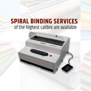 Spiral binding machine with stacks of bound documents