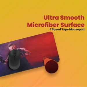 Red and black microfiber mousepad with a wireless mouse on top, showcasing its smooth surface.