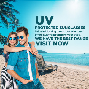 Couple wearing UV protected sunglasses on a beach