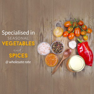 Overhead view of fresh vegetables, spices, and ingredients on a wooden surface with text 'Specialised in Seasonal Vegetables and Spices'