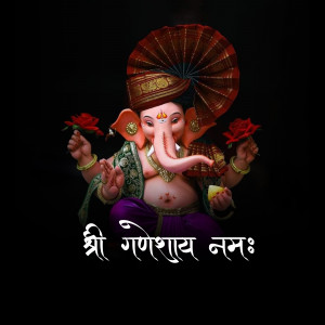 Close-up of Lord Ganesha statue with red flowers and text 'Shri Ganeshaya Namah'