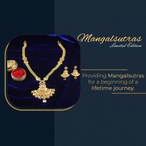Close-up of gold Mangalsutra necklace and earrings on a blue velvet background.