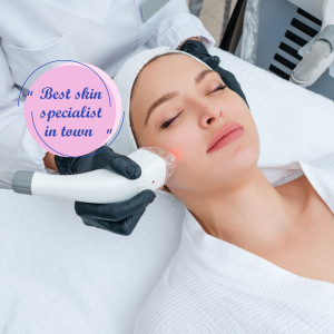 Woman receiving a facial treatment with a professional device.