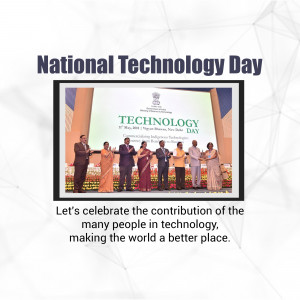 Group of people celebrating National Technology Day in front of a stage with the Technology Day logo.