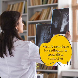 A female radiologist looking at X-ray images in a library setting.