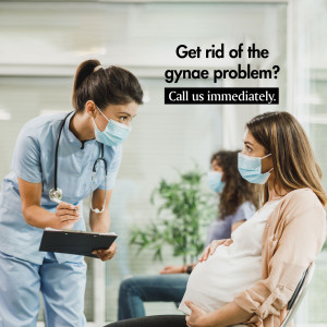 Doctor consulting with a pregnant patient in a clinic