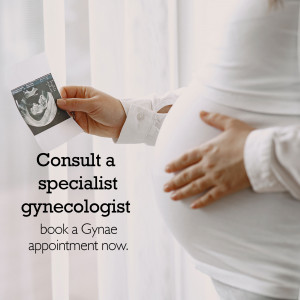 Pregnant woman holding an ultrasound image with text promoting gynecologist consultation.