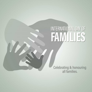 Graphic depicting hands reaching out with text 'International Day of Families'