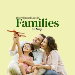 A family of three enjoying time together, looking at a paper airplane.